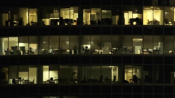 Ventanas de oficina al atardecer — Vídeos de Stock