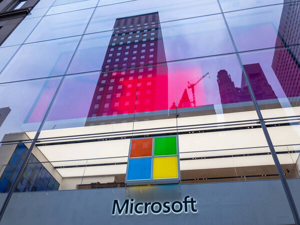 Microsoft company logo on facade of brand store on 5th avenue in manhattan
