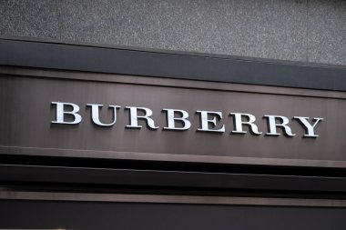 Burberry logo at the brand store facade clipart