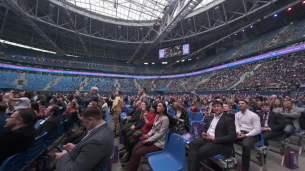 Business conference attendees sit and listen — Stock Video