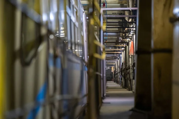 Long corridor inside industrial building — ストック写真