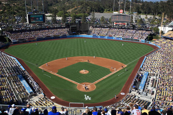 LOS ANGELES - JUNE 30: Classic view of Dodger Stadium before a sunny day baseball game on June 30, 2012 in Los Angeles, California. Dodger Stadium opened in 1962 and cost $23 million.