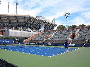 New York - 3 Eylül: 3 Eylül 2014'te New York'ta düzenlenen ABD Açık Tenis Şampiyonası'nda gençler takımı kort maçı. 1978'den beri Abd Açık Tenis Şampiyonası akrilik sert kortlarda oynanmıştır..