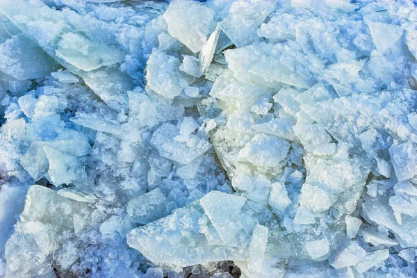 winter texture of broken ice close up