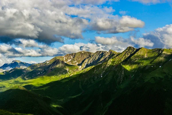 Caucasian mountains and cloudy sky on a summer day — Stock Photo, Image