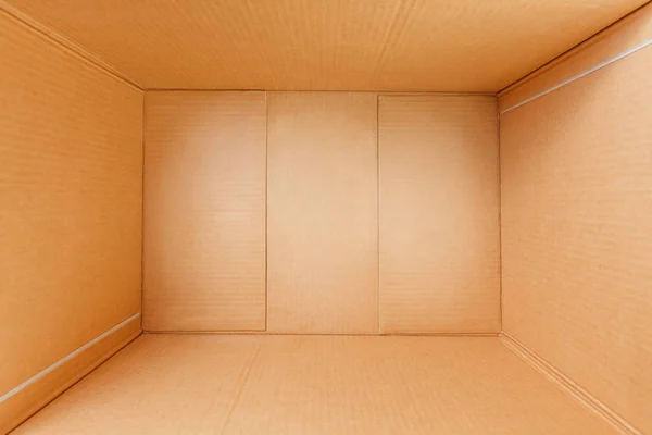 Empty cardboard box, inside view. Empty space for cargo, parcel and gift.