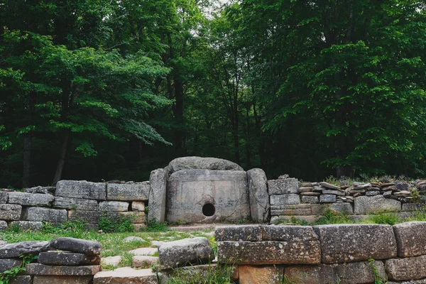 Ancient tiled dolmen in the valley of the river Jean. Monument of archeology megalithic structure