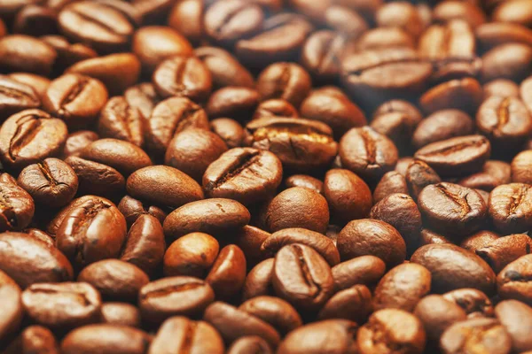 Roasted coffee beans, can be used as background. Soft contrast.