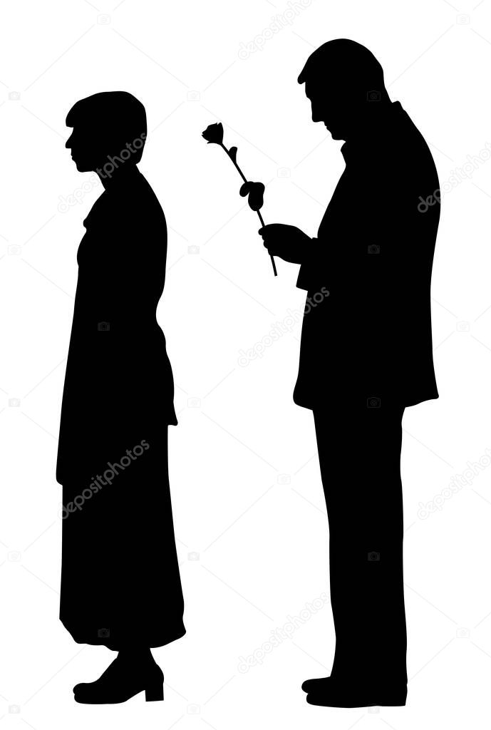 Man saying sorry and giving a rose to offended woman