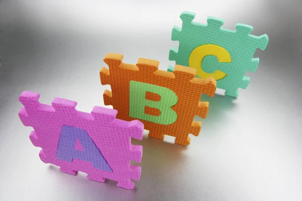 Alphabet Puzzles Seamless Background — Stock Photo, Image