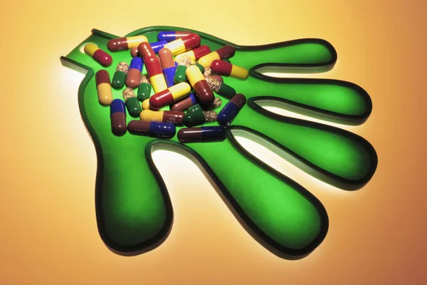 Pills Plastic Hand Red Background — Stock Photo, Image