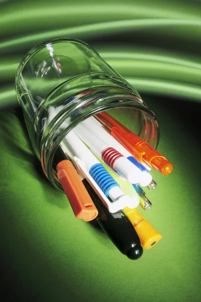 Pens Glass Jar Green Background — Stock Photo, Image