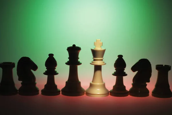 Chess Pieces Green Background — Stock Photo, Image