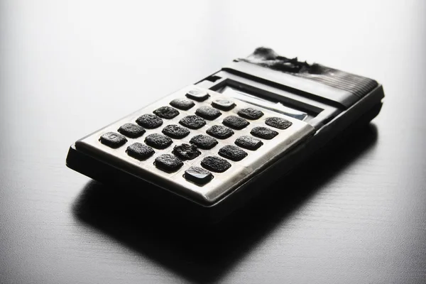 A Burnt Calculator — Stock Photo, Image