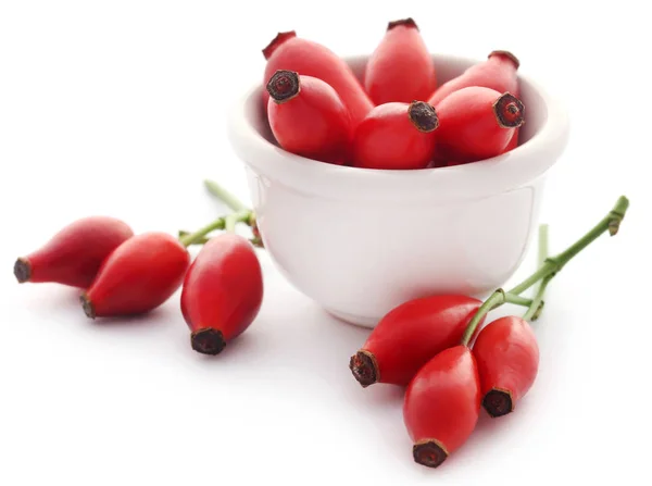 Tıbbi Rose Hips Kase Beyaz Arka Plan Üzerinde — Stok fotoğraf