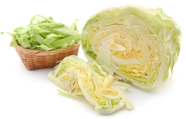 Fresh sliced Iceberg lettuce in a basket — Stock Photo, Image