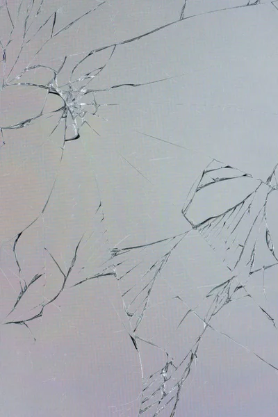 Top view cracked broken mobile screen glass texture background with the illumination turned on and visible pixels