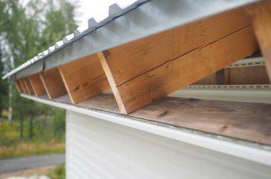 Çerçeve ev inşaatı. Siding yükleme