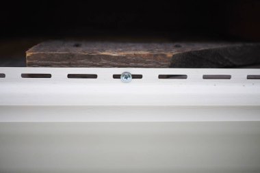 Çerçeve ev inşaatı. Siding yükleme