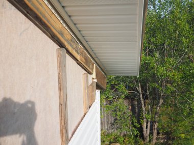 Çerçeve ev inşaatı. Siding yükleme