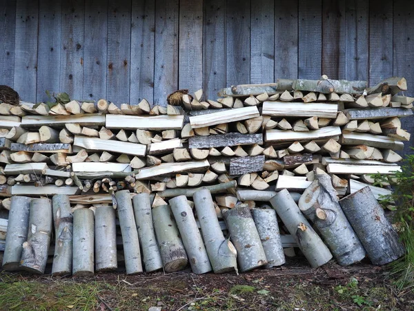 Aspen firewood in the barn — Stock Photo, Image