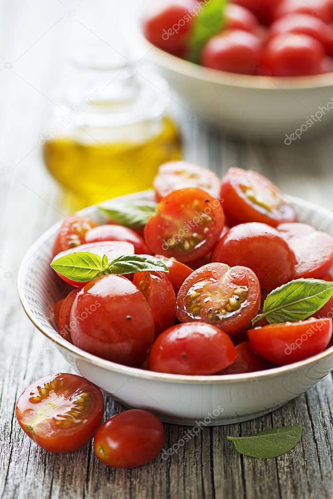Salad with cherry tomatoes. Home made food. Concept for a tasty and healthy meal.