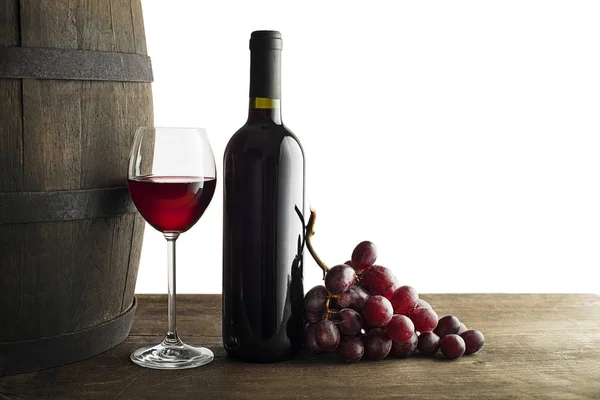 Red wine bottle and glass Stock Image
