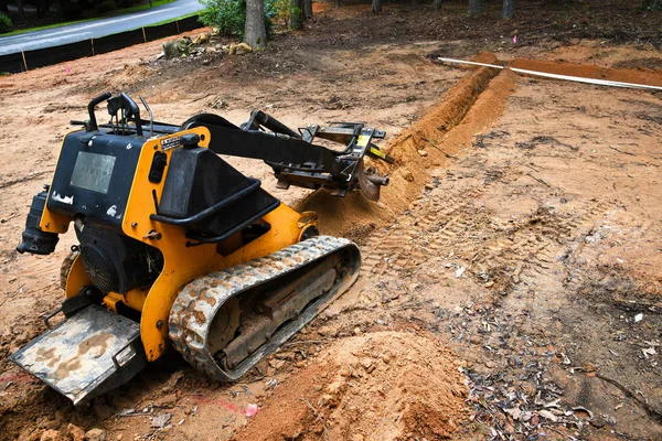 Digging a Ditch for Irrigation