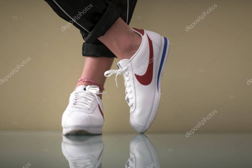 Pavia, Italy - January 24, 2018: Man wearing a pair of Nike Cortez