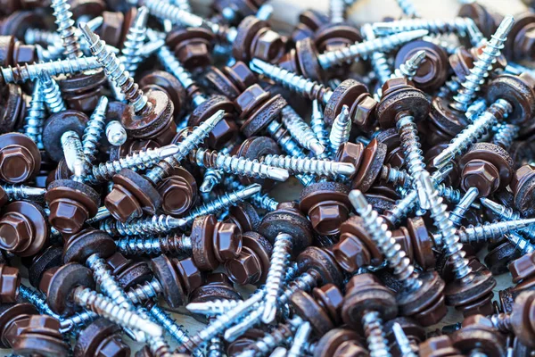 Background Galvanized Brown Roofing Screws — Stock Photo, Image