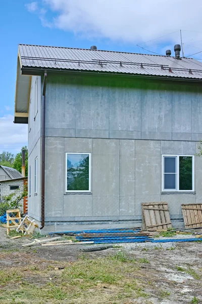 Bir iki katlı çerçeve ev çimento kurulu drenaj sistemi