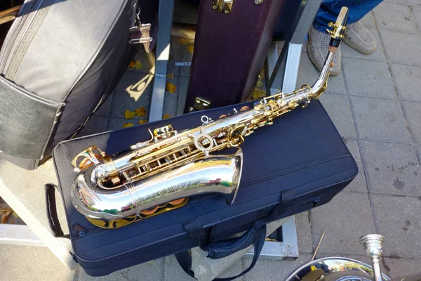 Saxophone on a closed case