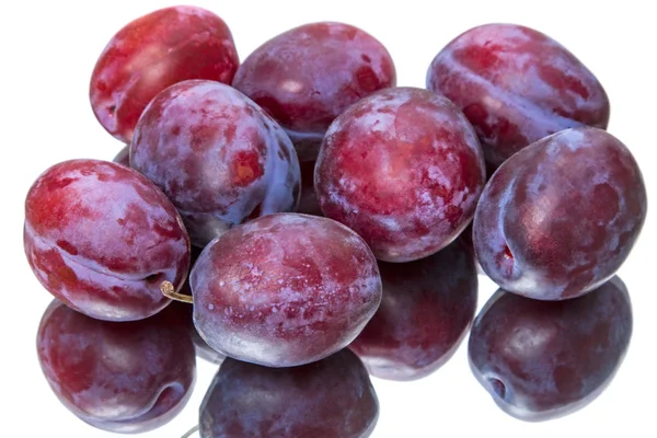 Eight plum on the mirror — Stock Photo, Image