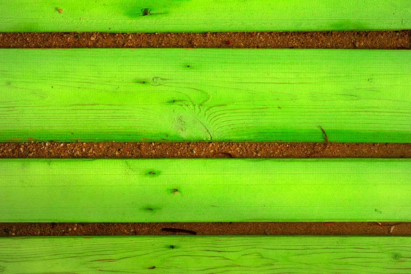 Fond Planches Bois Colorées Sur Sable Gros Plan — Photo