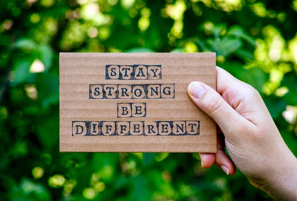 Woman Hand Holding Cardboard Card Words Stay Strong Different Made — Stock Photo, Image