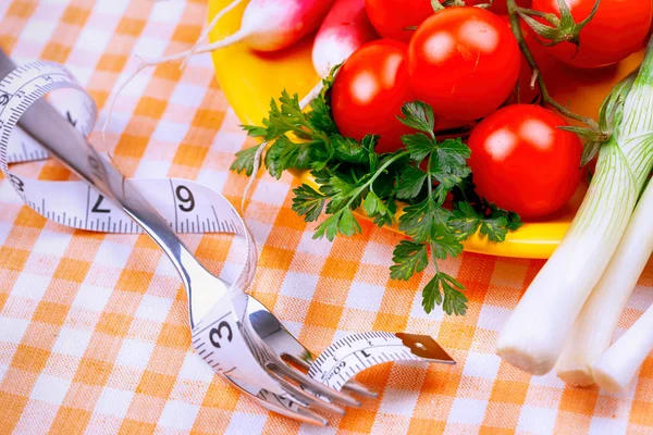Diet Concept Yellow Plate Vegetables Fork Tape Measure Checkered Tablecloth — Stock Photo, Image
