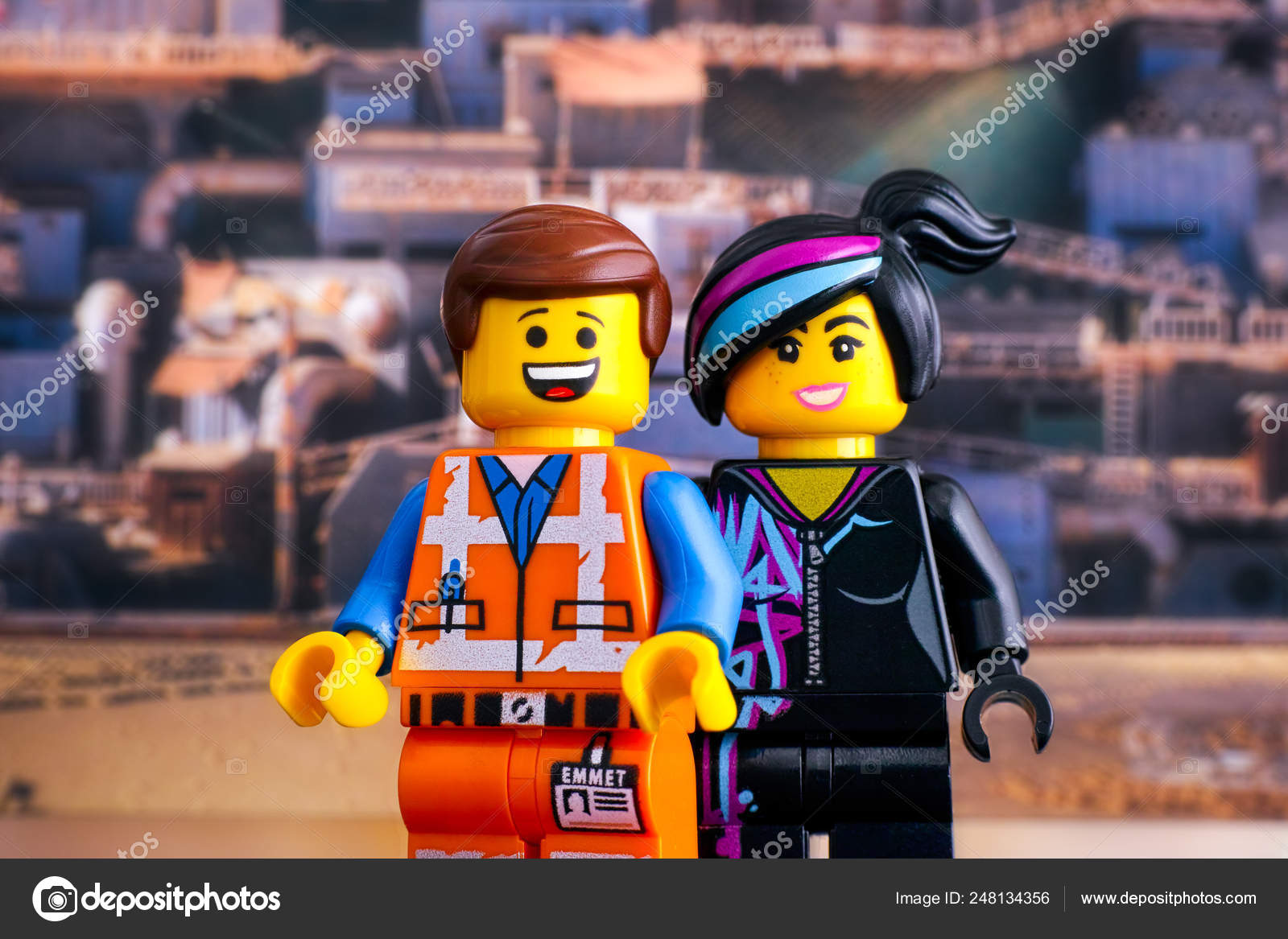 Lego Hard Hat Emmet and Lucy minifigures against Apocalypseburg – Stock