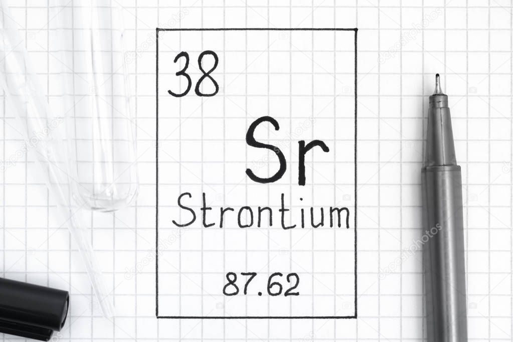 Handwriting chemical element Strontium Sr with black pen, test t