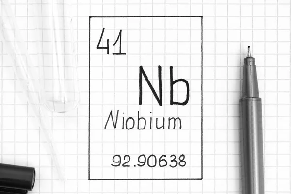 Handwriting chemical element Niobium Nb with black pen, test tub — Stock Photo, Image