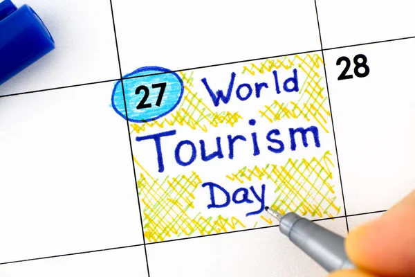 Vrouw Vingers Met Pen Schrijven Herinnering World Tourism Day Kalender — Stockfoto