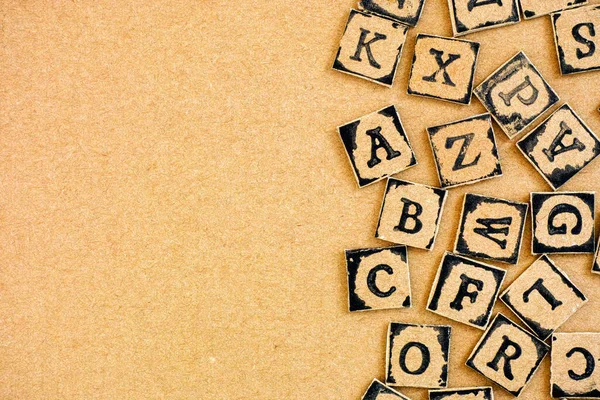 Cardboard Letters Made Alphabet Stamps Spelled Out Cardboard Backgrounds — Stock Photo, Image