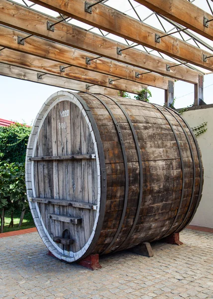 Wooden barrel for wine fermentation.