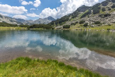 Amazing Landscape with Muratovo Lake and Banderishki Chukar Peak, Pirin Mountain, Bulgaria clipart