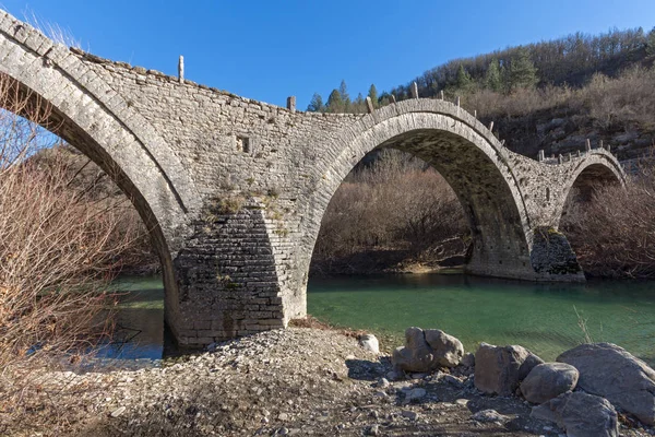 Landscape of Ancient Bridge of Missios in Vikos gorge and Pindus Mountains, Zagori, Epirus, Greece