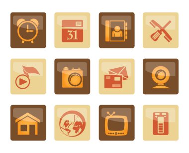 cep telefonu ve bilgisayar simgeler üzerinde kahverengi zemin - vektör Icon set