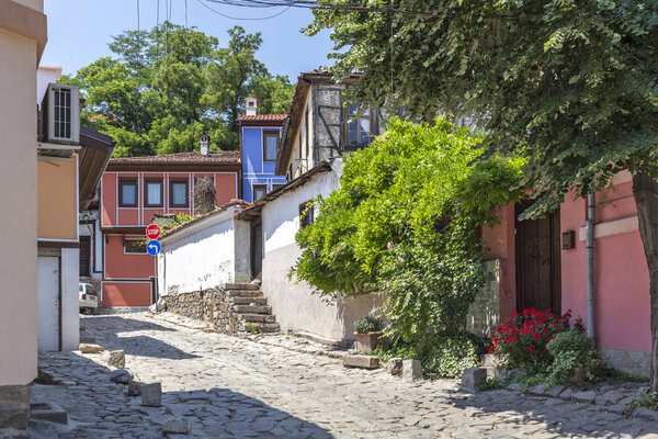 PLOVDIV, BULGARIA - MAY 29, 2019: Street and Nineteenth Century Houses in architectural and historical reserve The old town in city of Plovdiv, Bulgaria