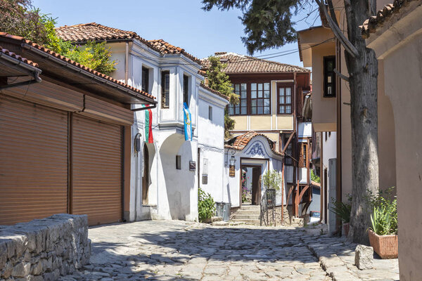 PLOVDIV, BULGARIA - MAY 29, 2019: Street and Nineteenth Century Houses in architectural and historical reserve The old town in city of Plovdiv, Bulgaria