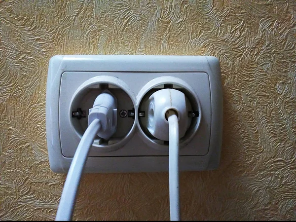 Electric socket and electric plug.