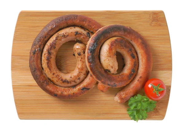 木製のまな板に揚げパン白ワイン豚のソーセージ — ストック写真