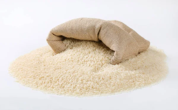 White Rice Spilling Out Burlap Bag — Stock Photo, Image